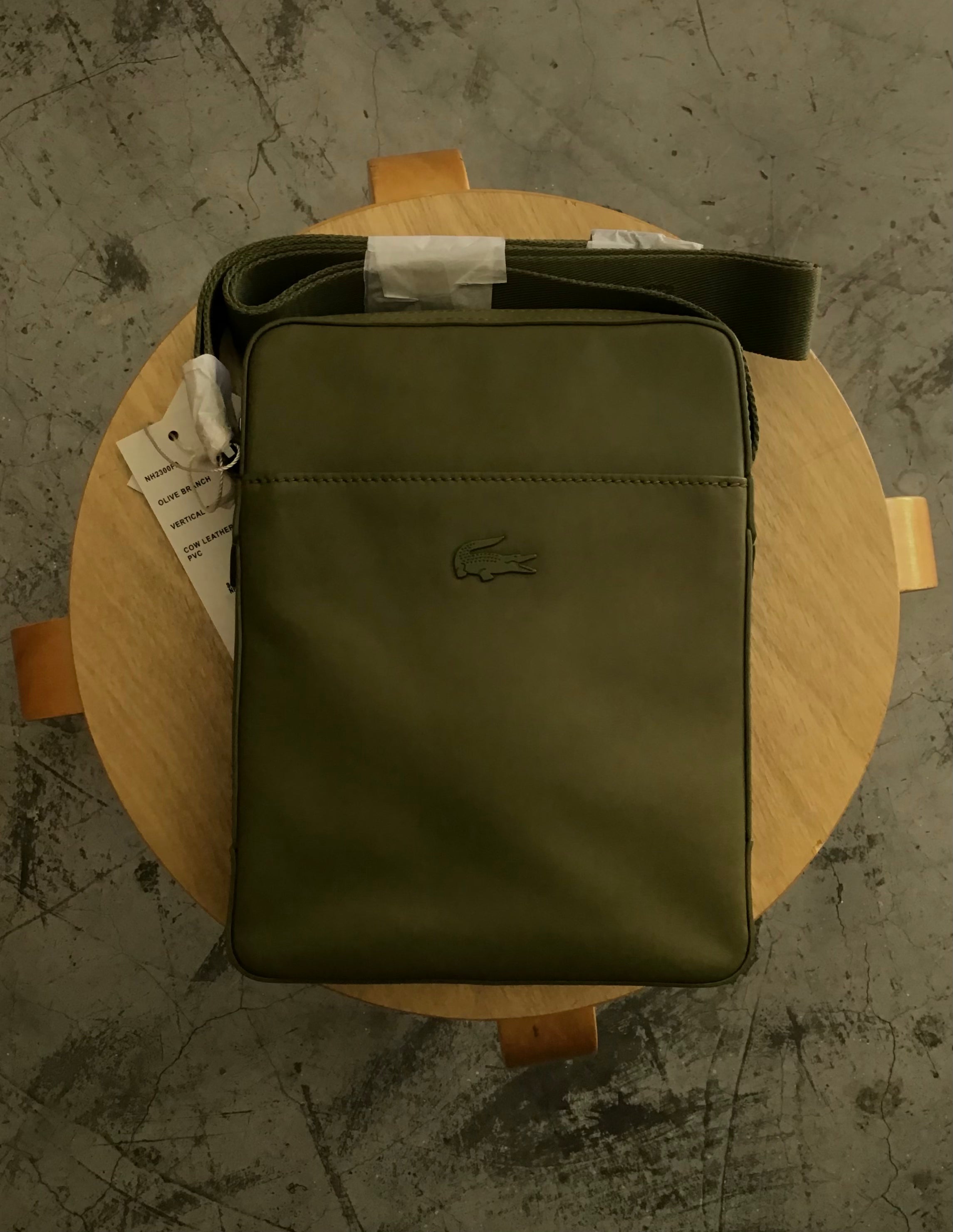 Lacoste cow sales leather bag